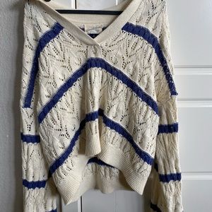 Sweater with design holes